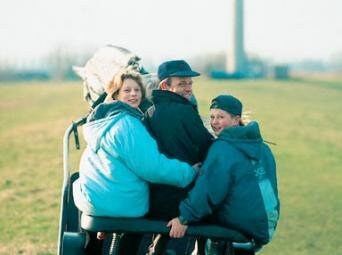 Gerd Sosath and his children Janne and Hendrik on the carriage